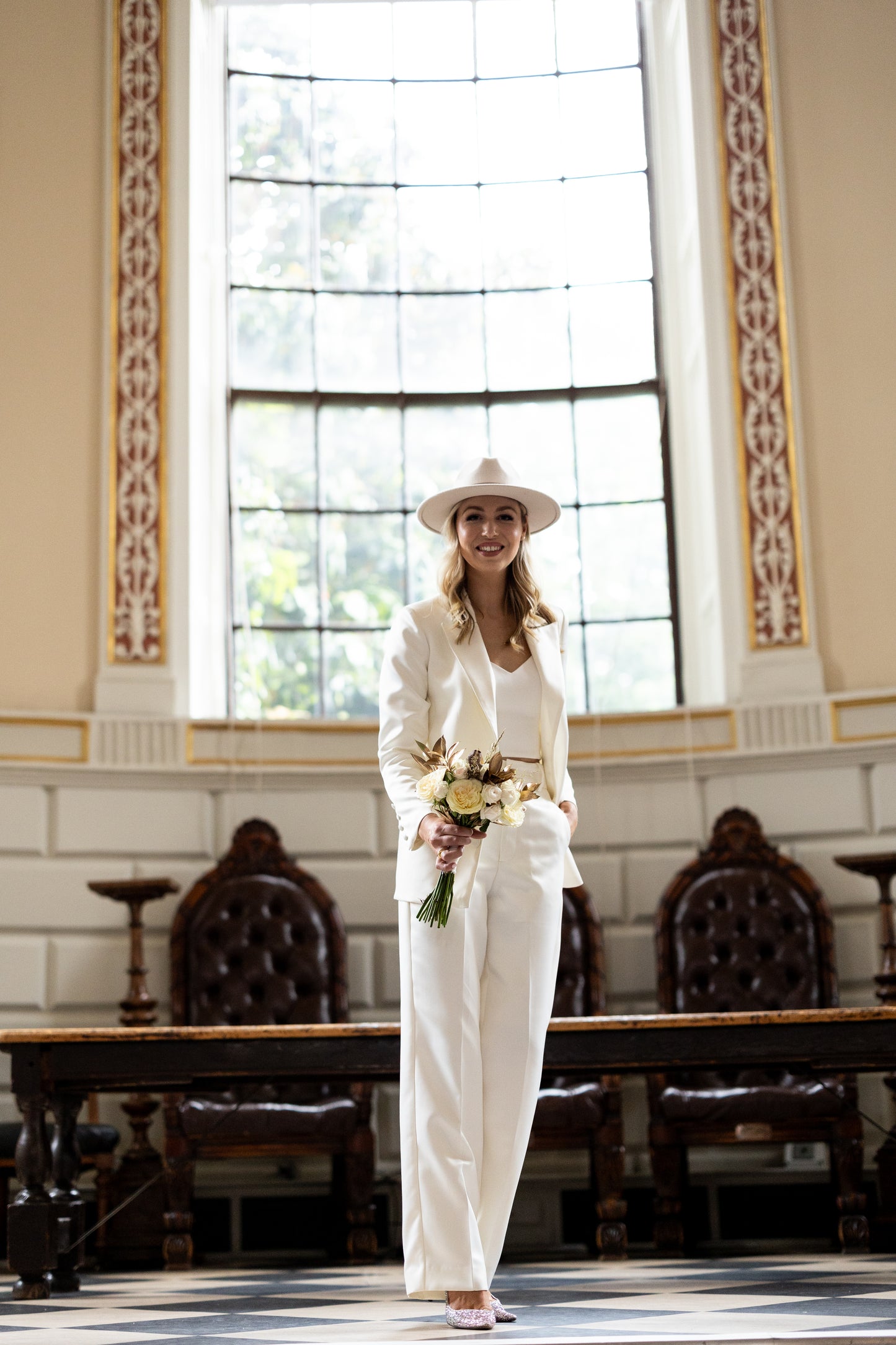 Irish bride wearing tuxedo style jacket and trousers in Ireland