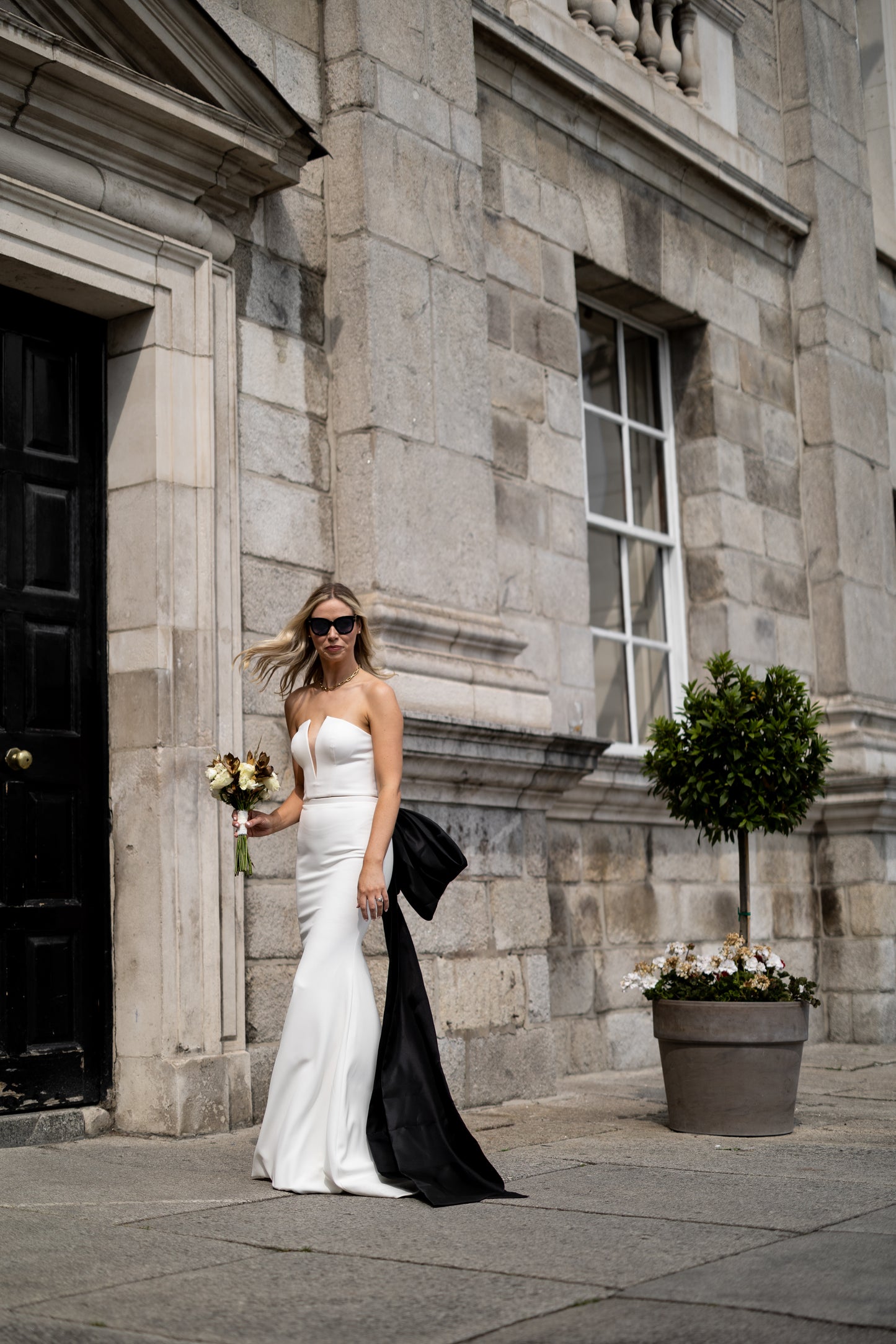 Irish bride with oversized statement black organza bow