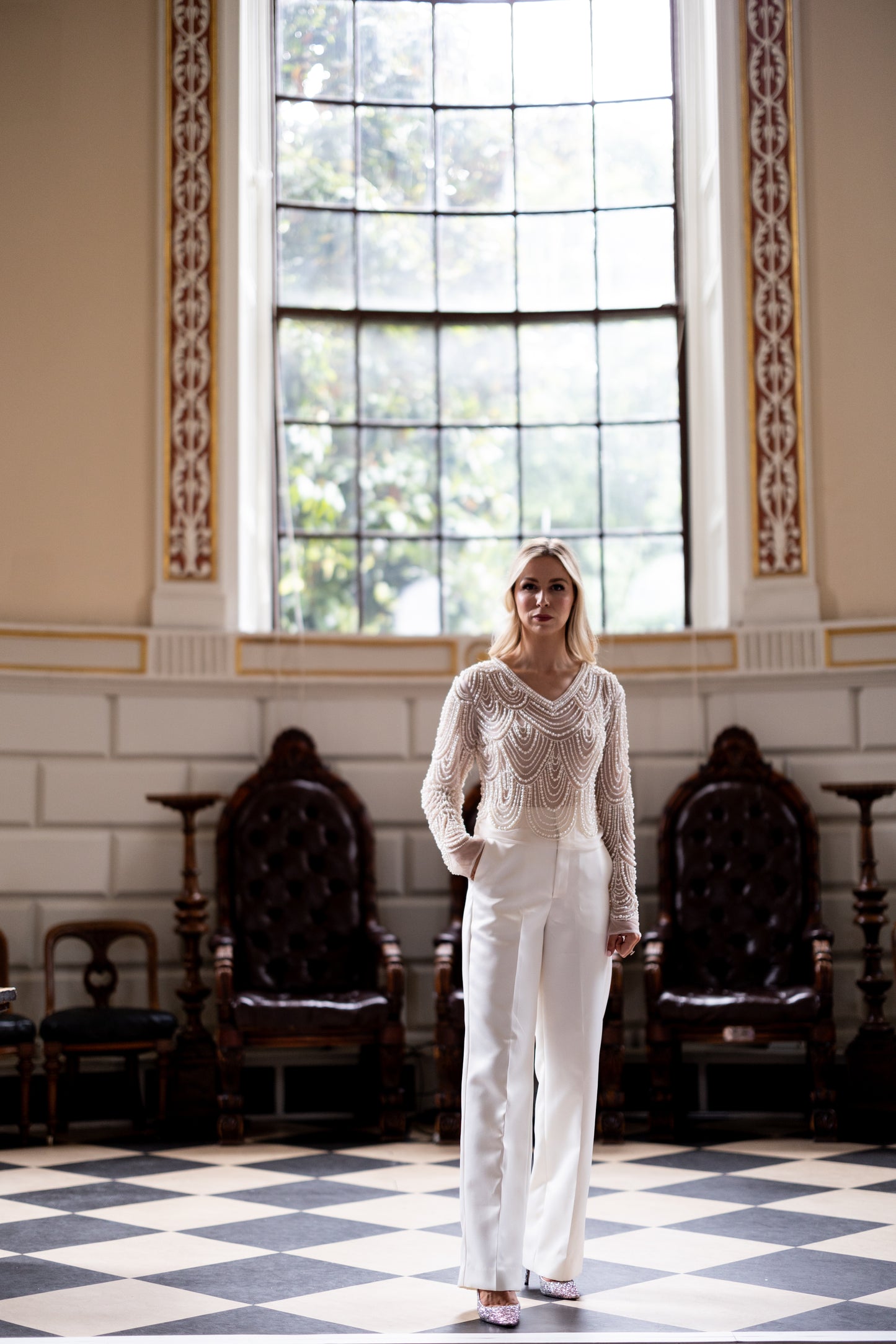 Irish bride wears hand beaded bridal top with sleeves in Cork
