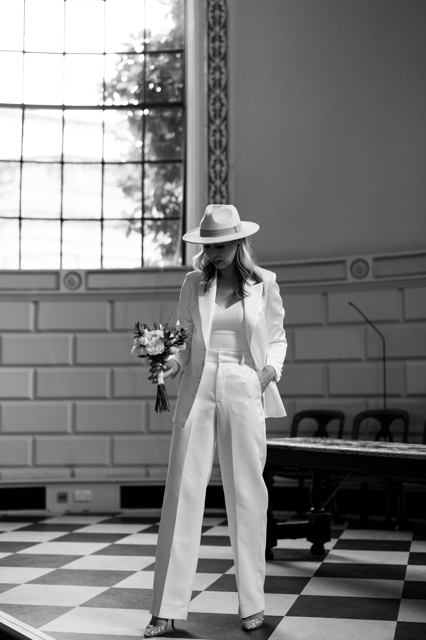 Irish bride wearing tuxedo style jacket and trousers in Ireland 