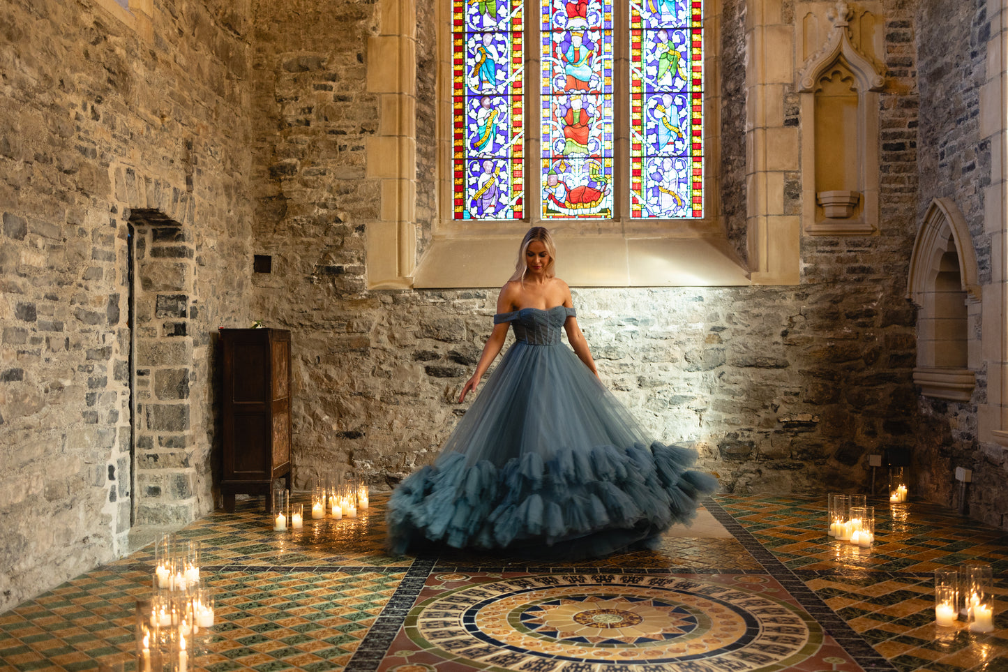Blue off-the-shoulder tulle wedding dress  with textured ruffled train ireland — editorial outdoor bridal portrait by Mizz Rio