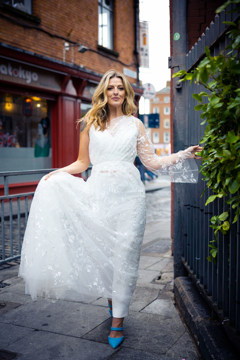 Irish bride wears a one shoulder lace wedding dress in Dublin 