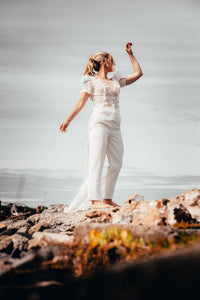 Irish bride in lace jumpsuit with trousers